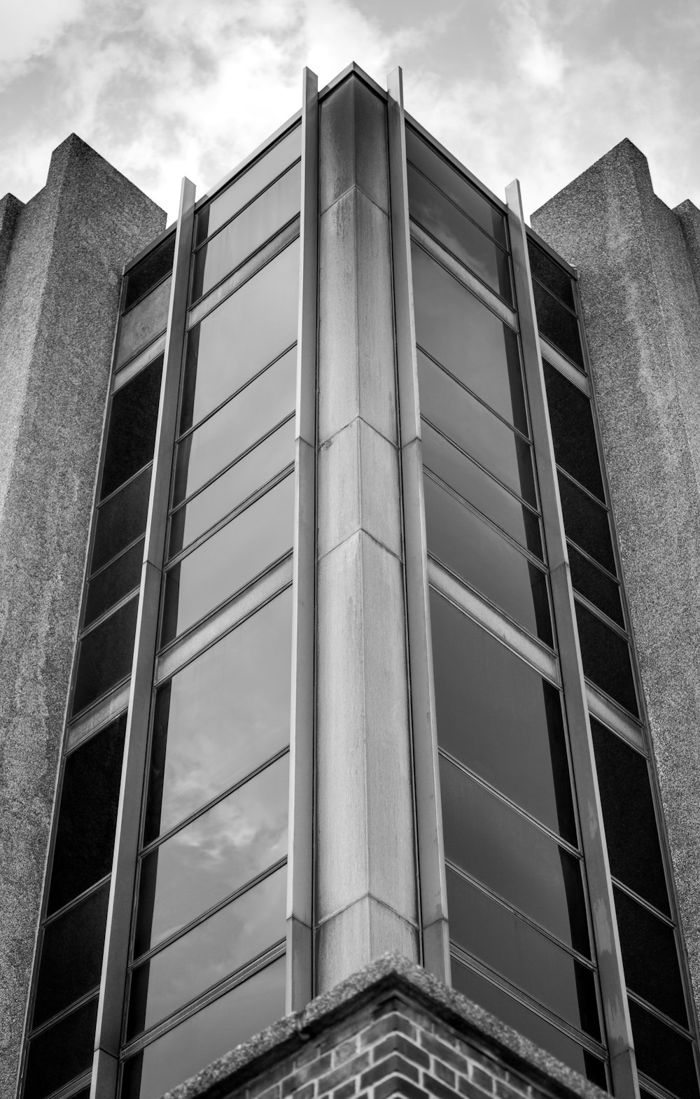 grayscale photo of concrete building