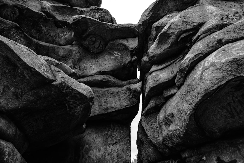 gray scale photo of rock formation