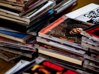 A collection of colorful Minidisc cases arranged neatly.