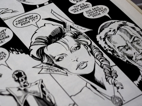 A close-up view of a black and white comic book page featuring detailed illustrations of characters with speech bubbles. The main character has a braided hairstyle, and the speech text includes a dialogue questioning who could have done something.