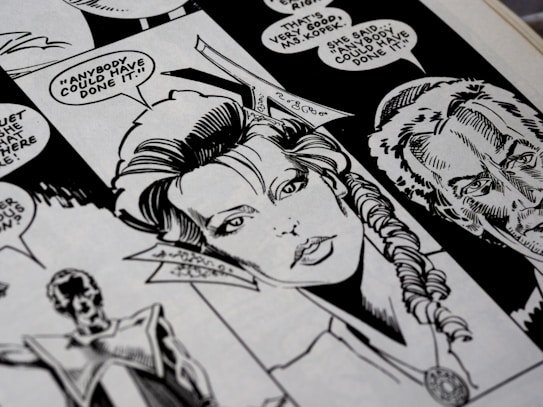 A close-up view of a black and white comic book page featuring detailed illustrations of characters with speech bubbles. The main character has a braided hairstyle, and the speech text includes a dialogue questioning who could have done something.