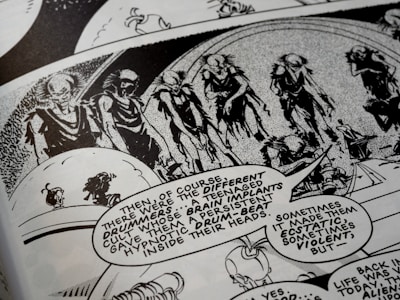A black-and-white comic book page features a series of humanoid figures with skeletal appearances marching in a procession. The scene is accompanied by speech bubbles with dialogue describing a cult and brain implants that produce a drumbeat, impacting emotions. The artwork is detailed with an abstract background, enhancing the surreal, eerie atmosphere.