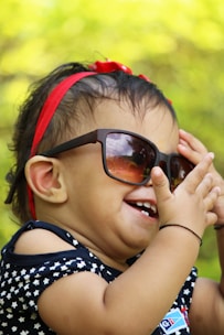 girl in black framed sunglasses