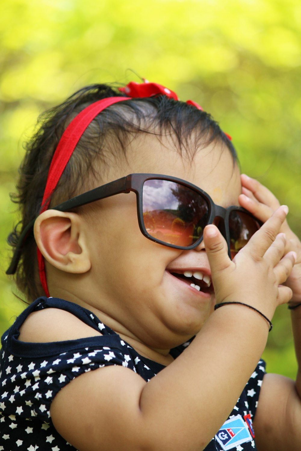 girl in black framed sunglasses