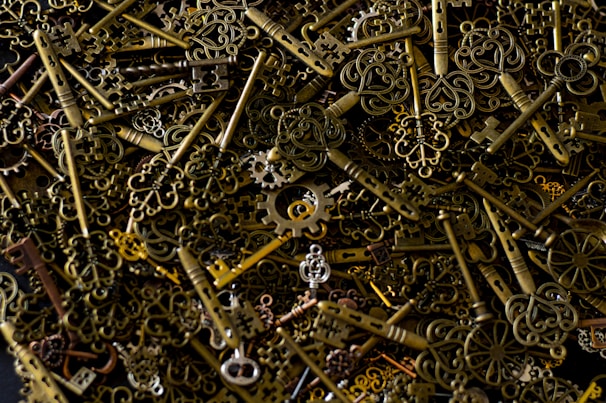 An elegant display of vintage keys and trinkets repurposed into unique decorative pieces.