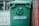 A happy customer standing next to a boro bins dumpster.