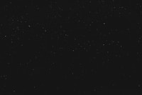 black textile on black background