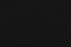 black textile on black background