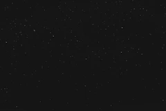 black textile on black background