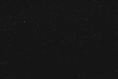 black textile on black background