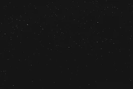 black textile on black background