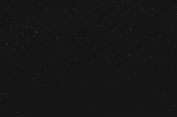 black textile on black background