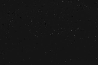 black textile on black background