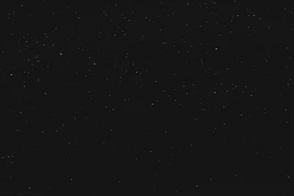 black textile on black background