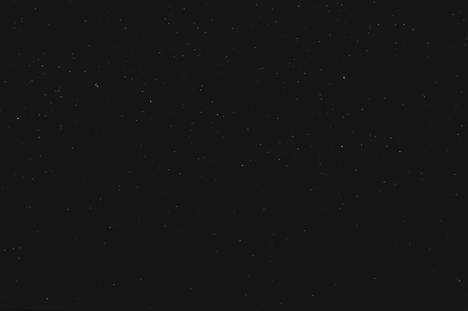 black textile on black background