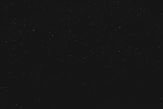 black textile on black background