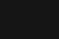 black textile on black background