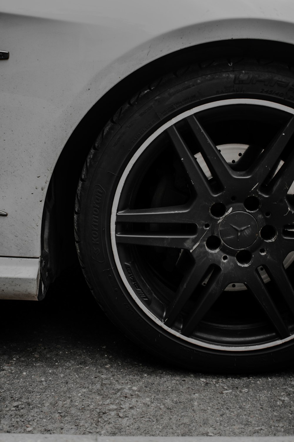 black 5 spoke wheel with tire