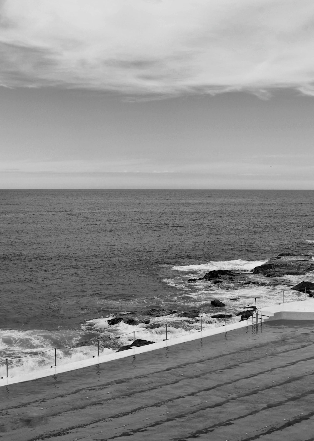 grayscale photo of body of water