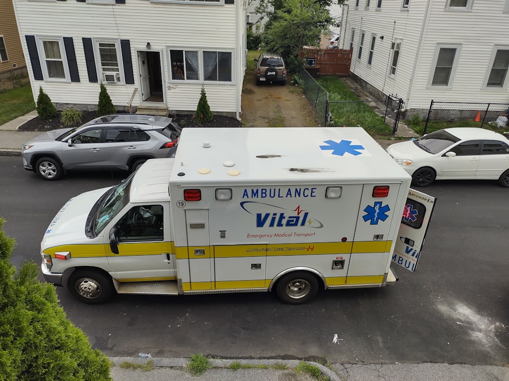 an ambulance parked on the side of the road