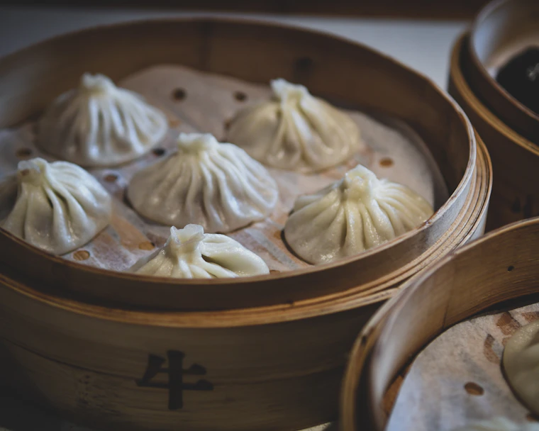 Xiao long bao soup dumplings in a steamer