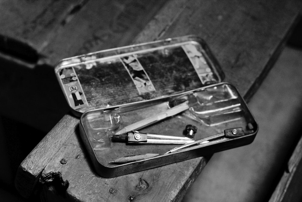 grayscale photo of smartphone on table