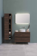 white ceramic sink beside brown wooden cabinet
