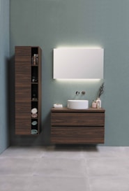 white ceramic sink beside brown wooden cabinet