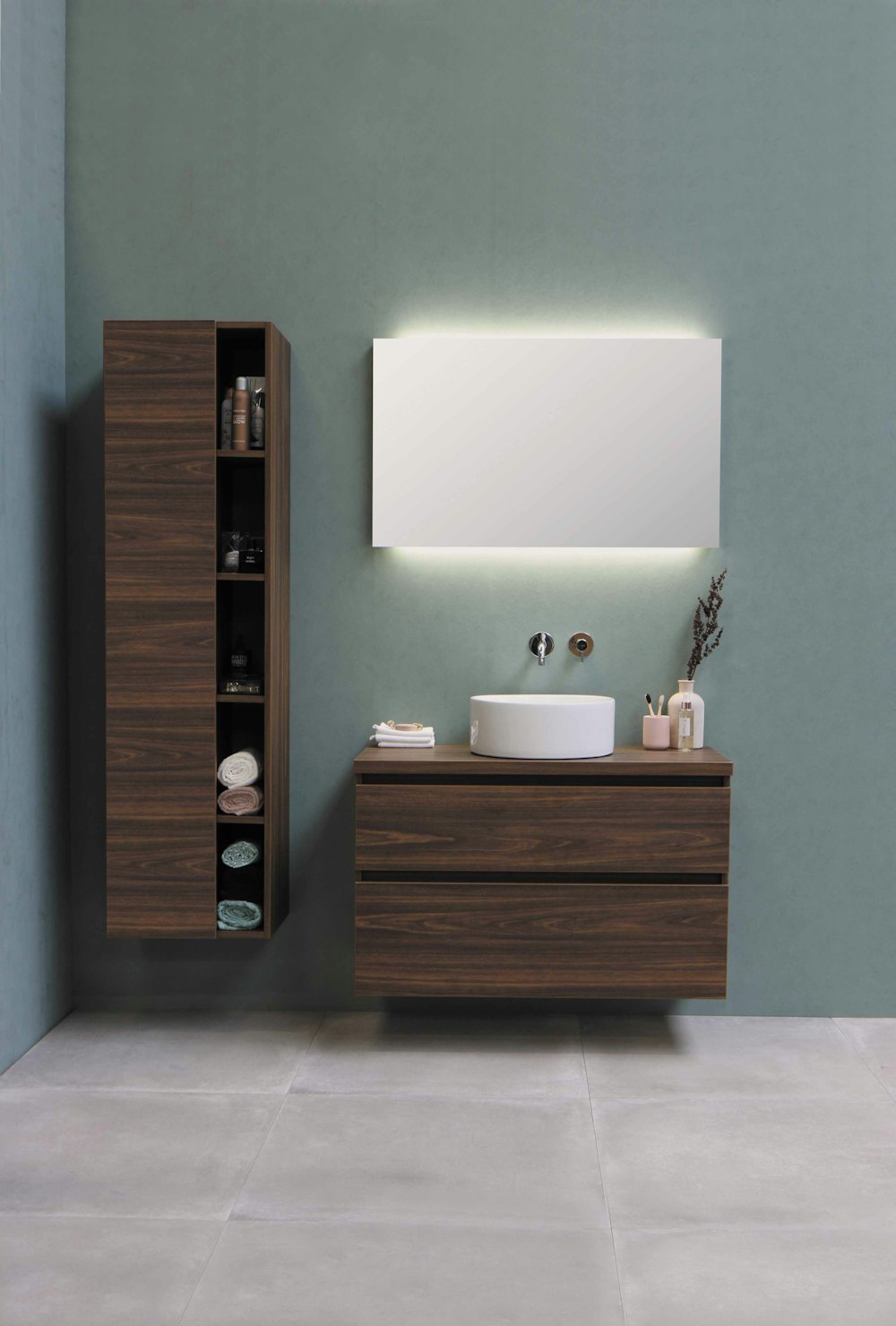 white ceramic sink beside brown wooden cabinet