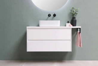 white wooden cabinet with mirror