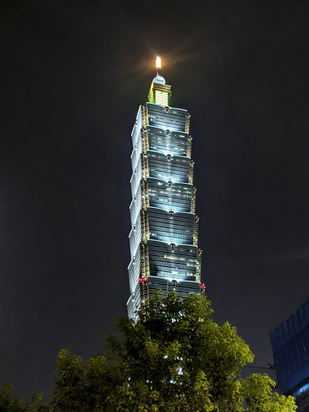 white and black tower during night time