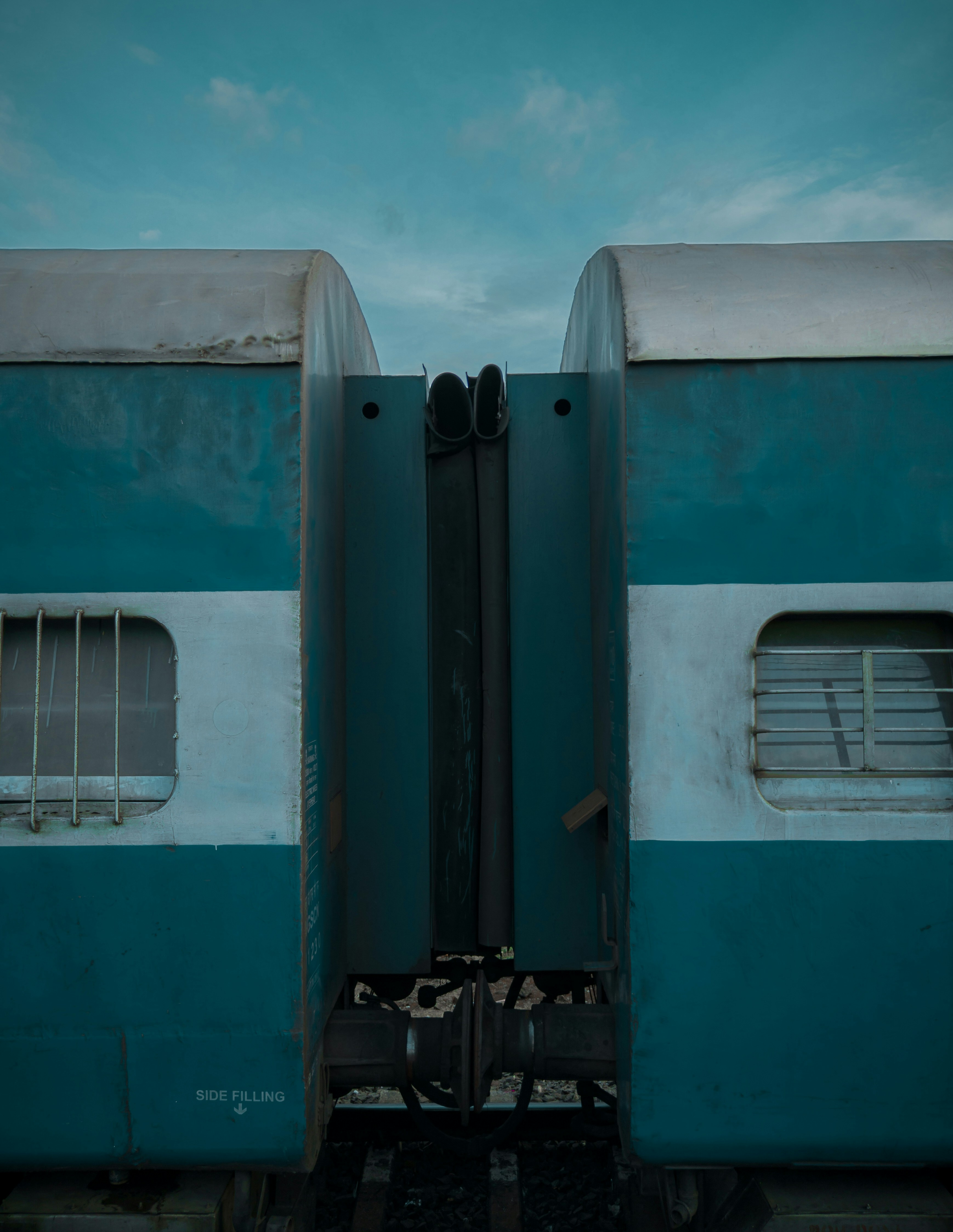 white and green train under blue sky during daytime