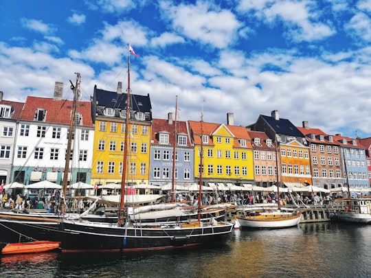 boat on dock near buildings during daytime in Mindeankeret Denmark