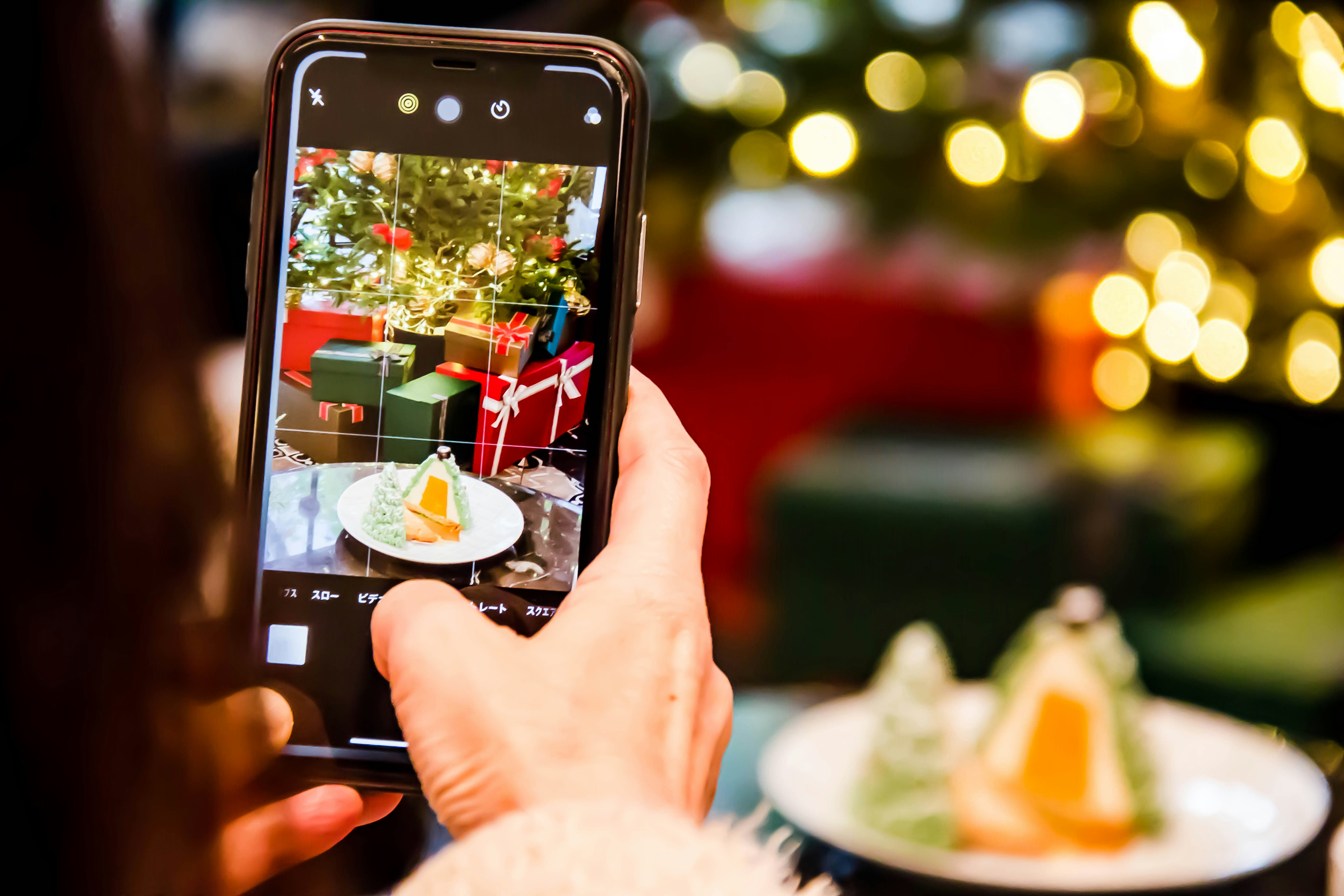 person holding black iphone 5