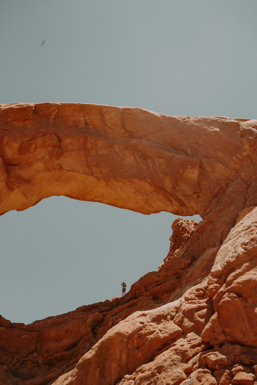 brown rock formation under blue sky during daytime