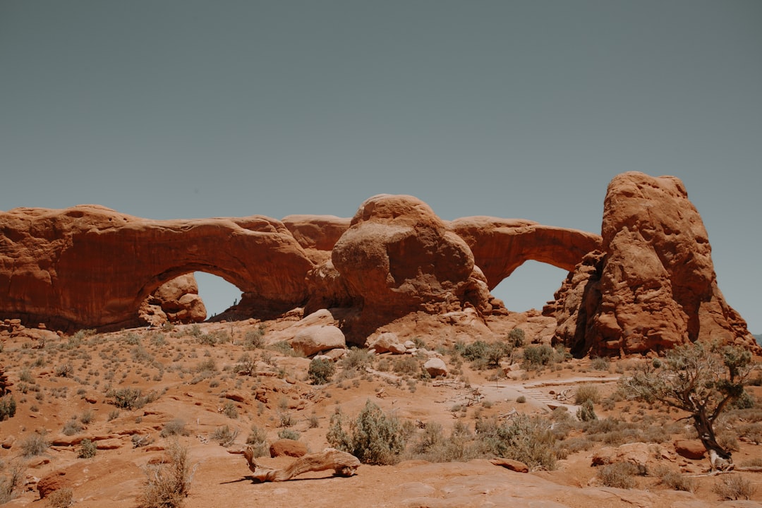 brown rock formation under blue sky during daytime