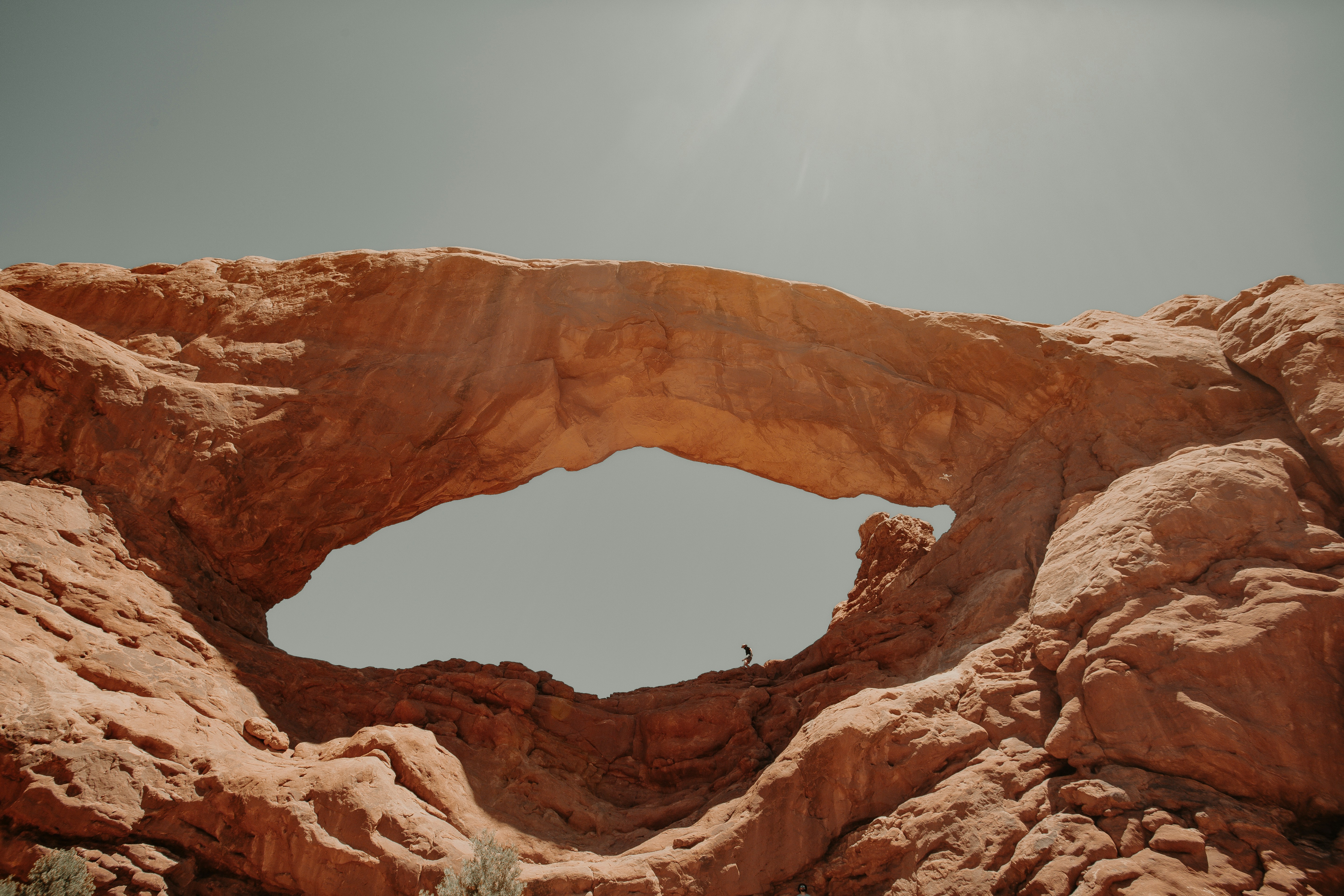 brown rock formation under blue sky during daytime, Please follow me on instagram! @chrishenry