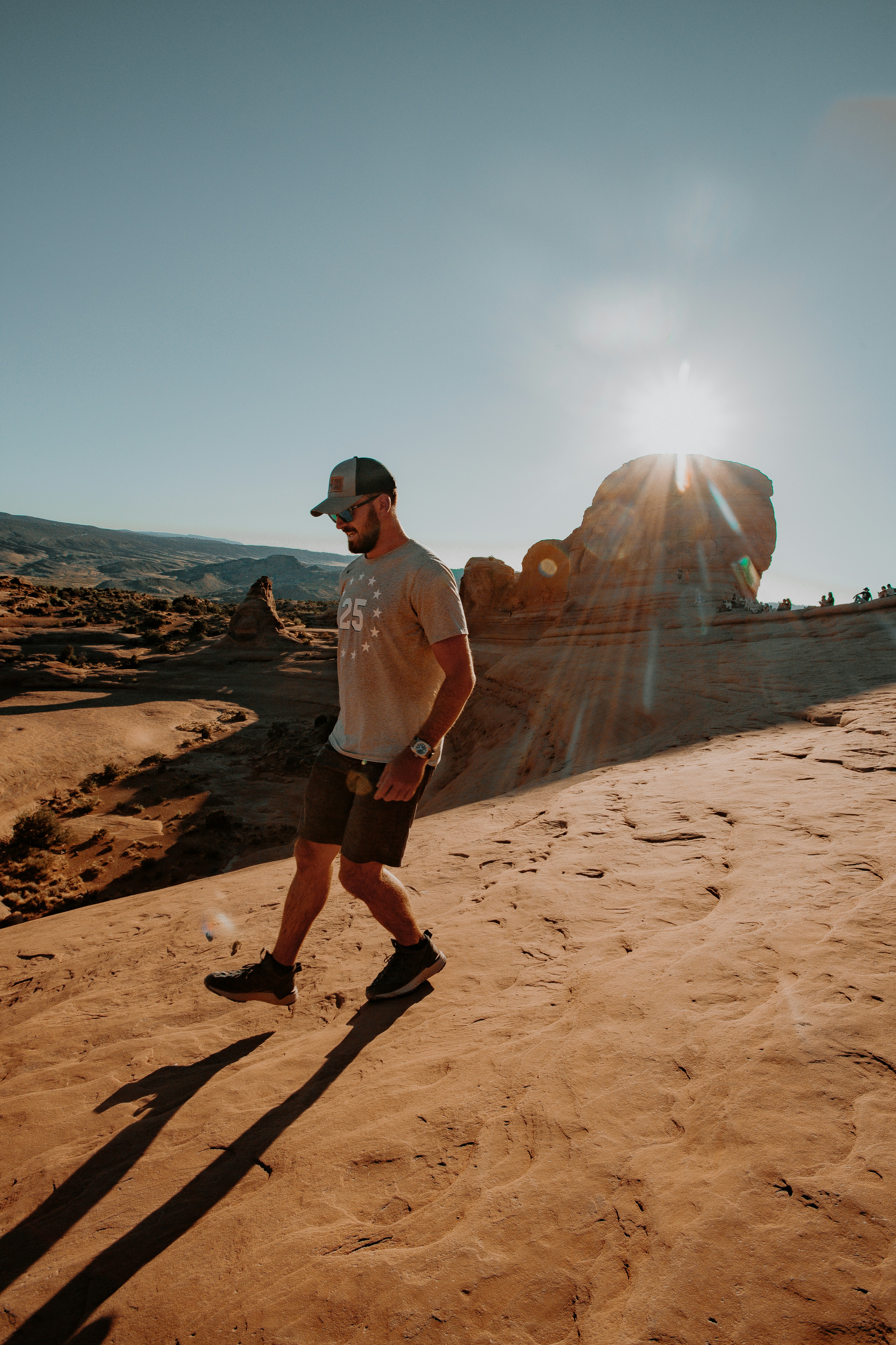Hiking gear for hot weather conditions in a desert landscape