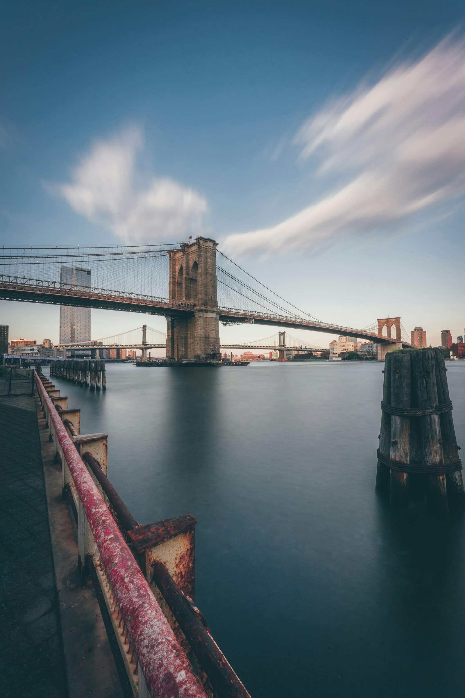 Sony a7 III + Sigma 14-24mm F2.8 DG DN Art sample photo. Brown bridge under blue photography