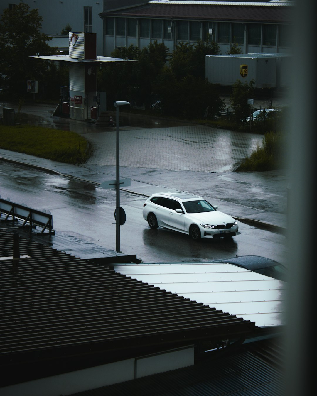 white sedan on gray wooden dock during daytime