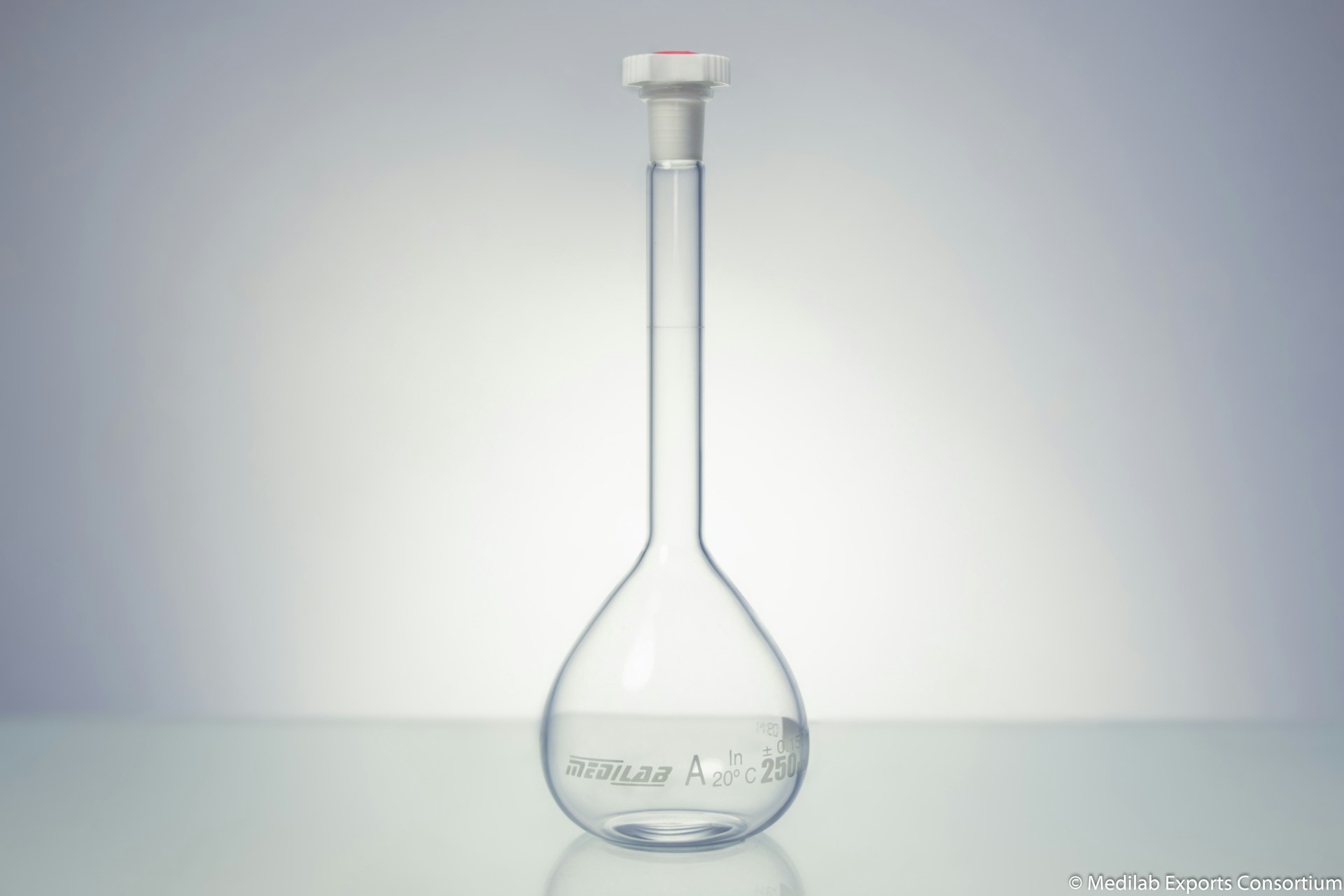 clear glass bulb on white surface