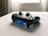 Sleek Xbox Series X console glowing softly under ambient lighting.