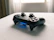 Sleek Xbox Series X console glowing softly under ambient lighting.