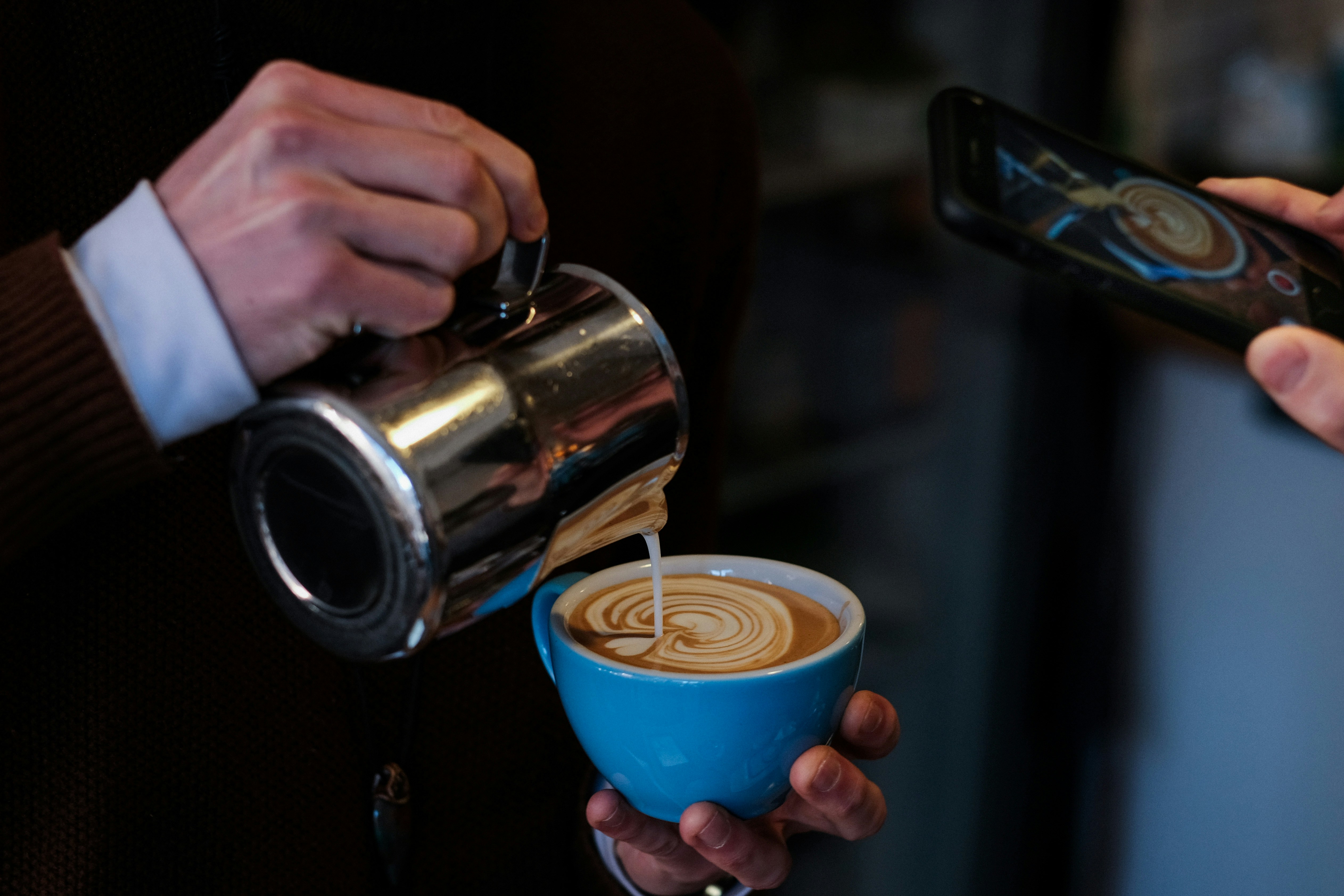 Barista serving in a coffee shop — illustrating How to File a DBA in Indiana 2026.