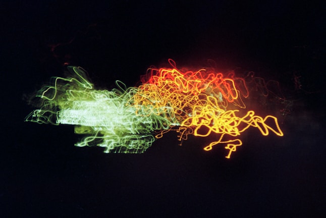 A dynamic music video promotion with bold colors and animated graphics.