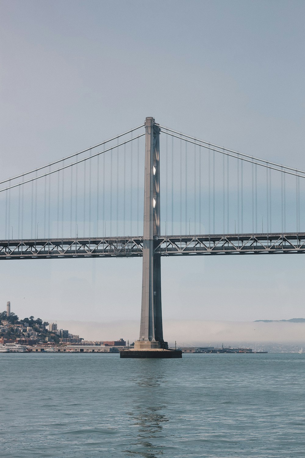 bridge over body of water during daytime