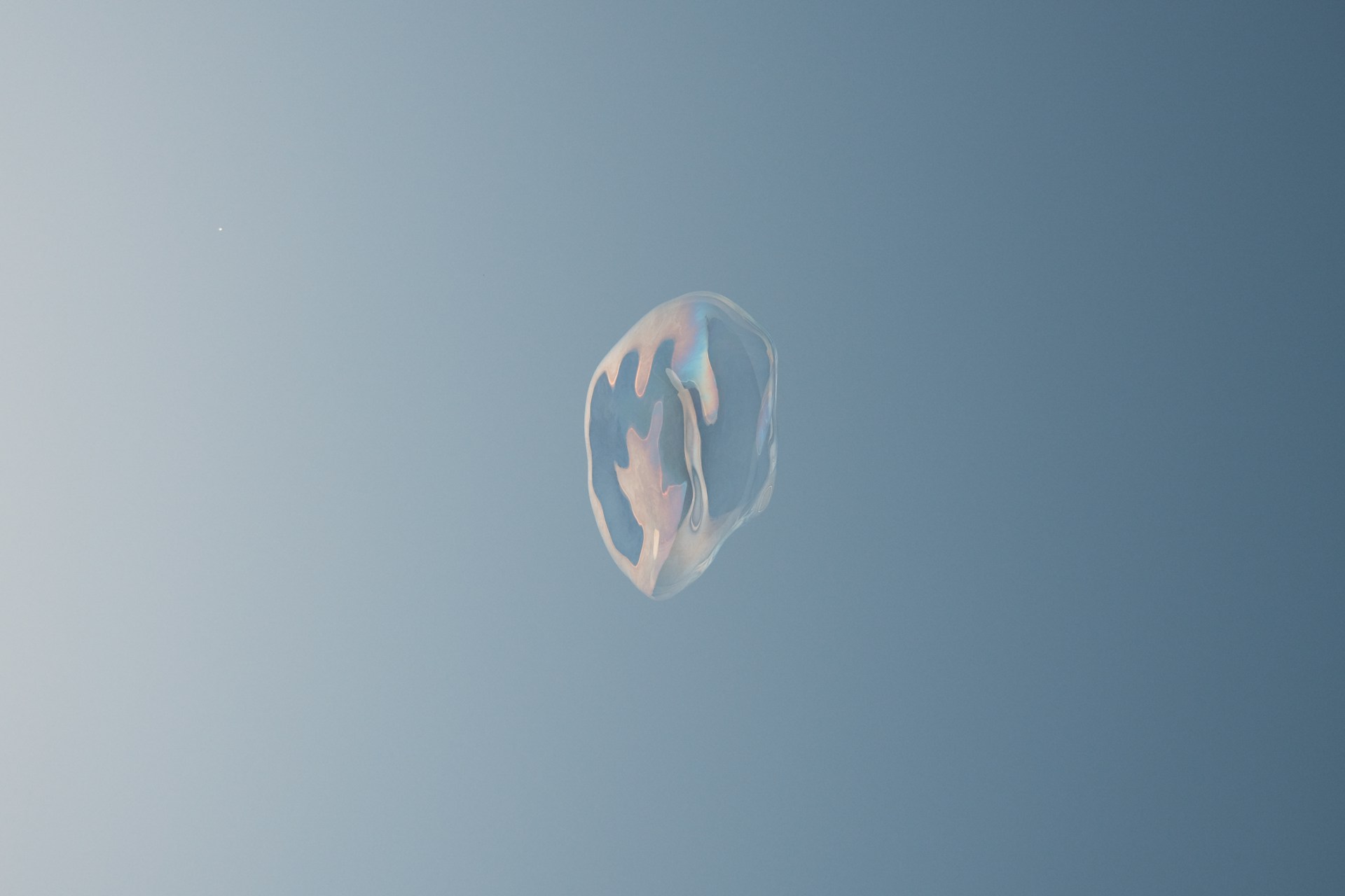 woman wearing yellow long-sleeved dress under white clouds and blue sky during daytime