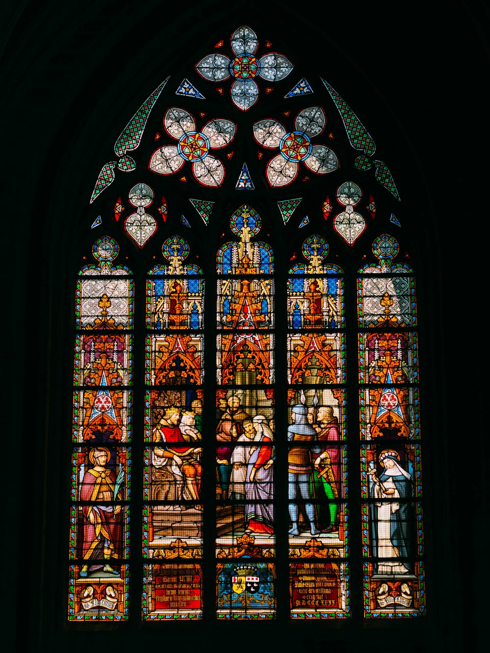 blue red and yellow floral glass window