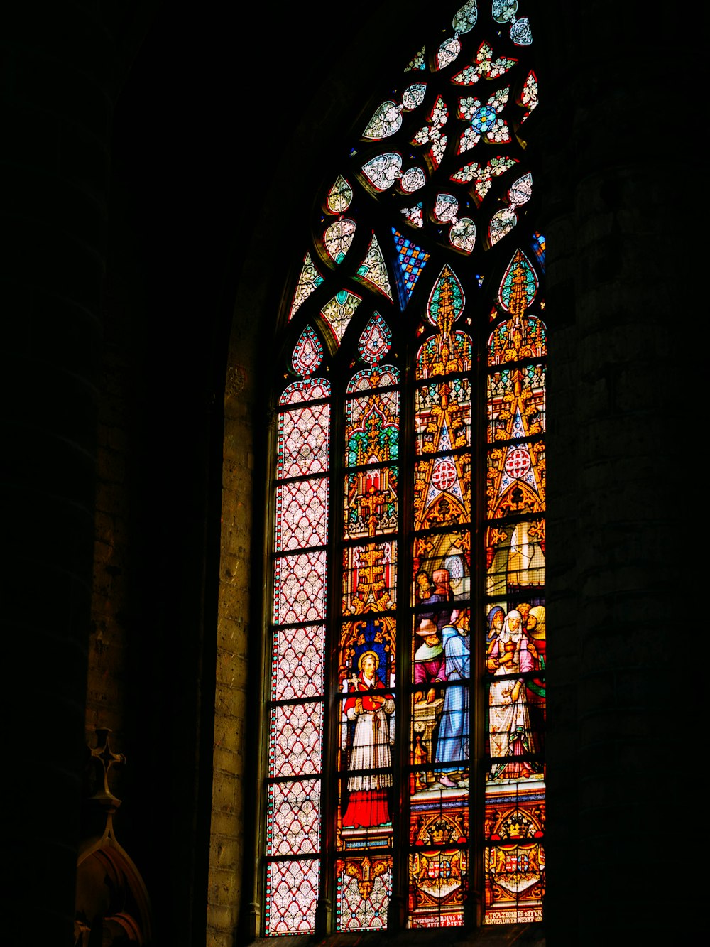 blue red and yellow glass window