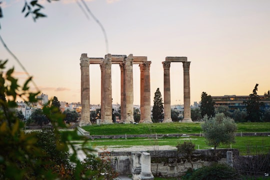 brown concrete pillar during daytime in Temple of Olympian Zeus Greece